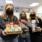 C.A.R.E.S. Crews Collect Books and Canned Food
